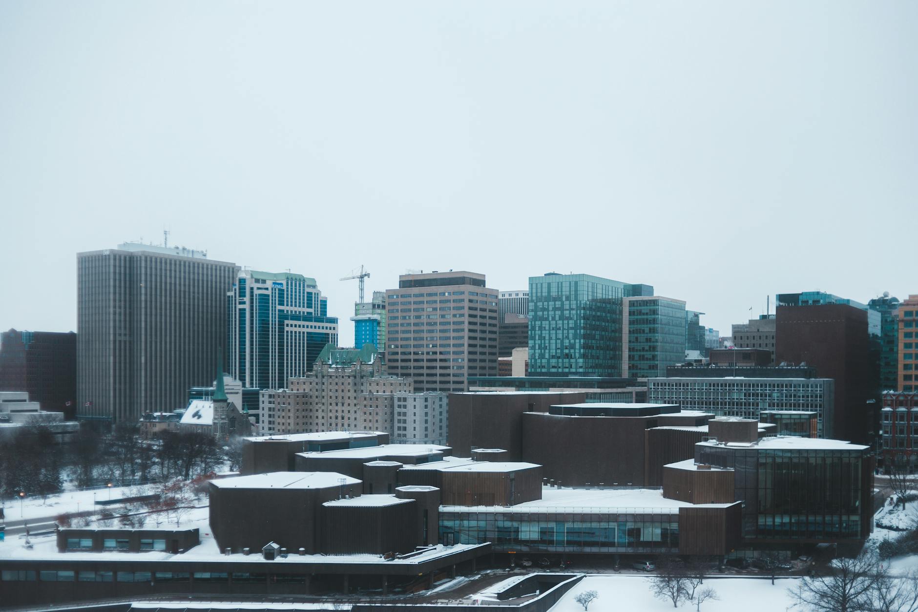 city skyline under white sky