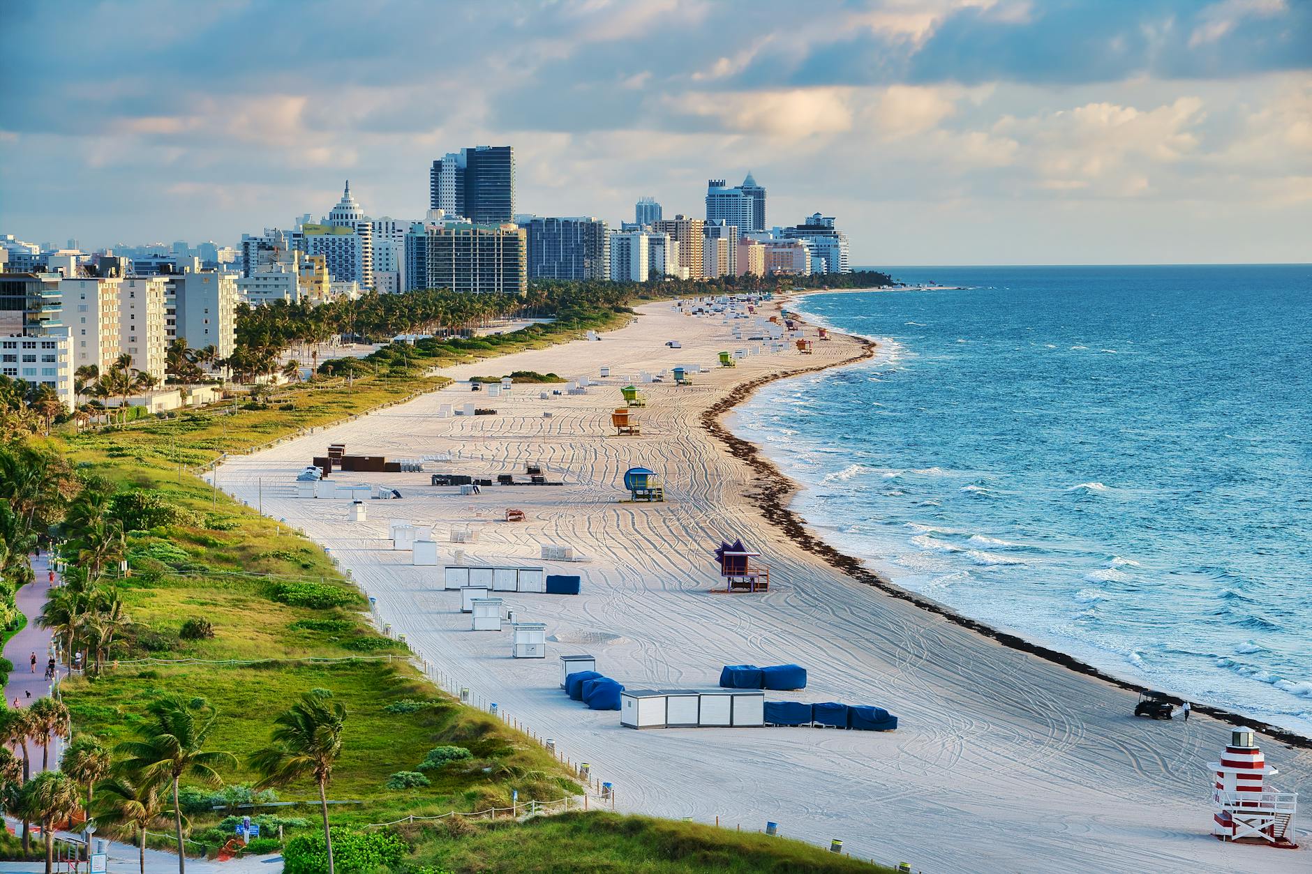 aerial view of city buildings beside the ocean