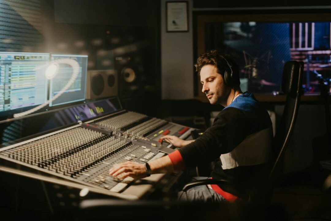 a man in control of the recording studio